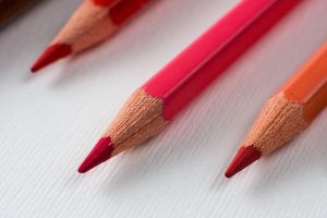 "Three red colored pencils" by Horia Varlan